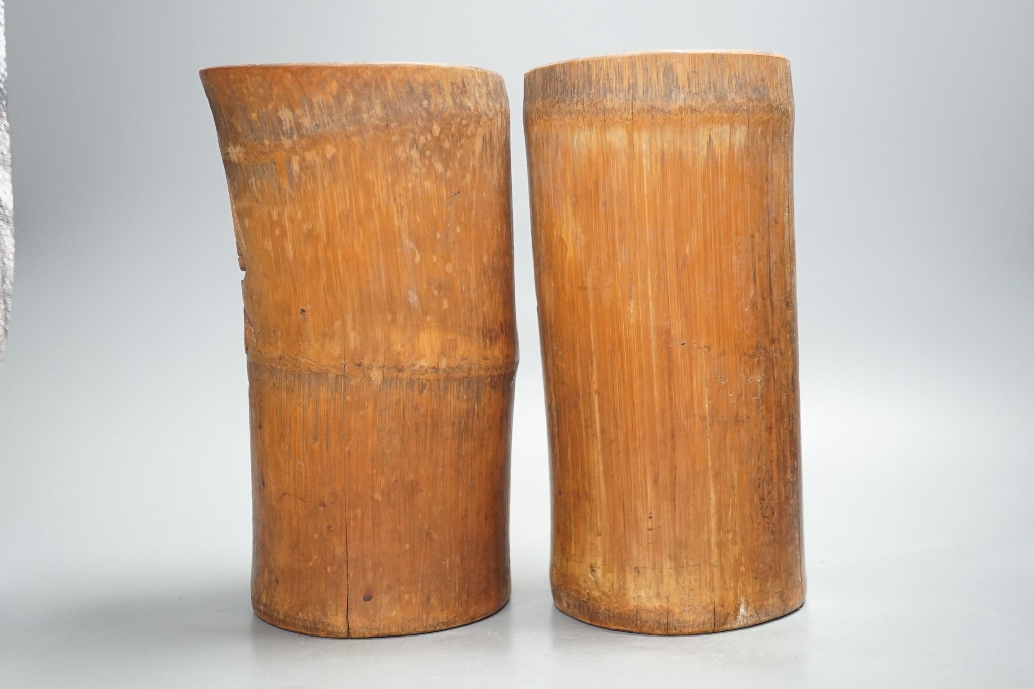 A pair of Chinese carved bamboo brush pots 25cm
